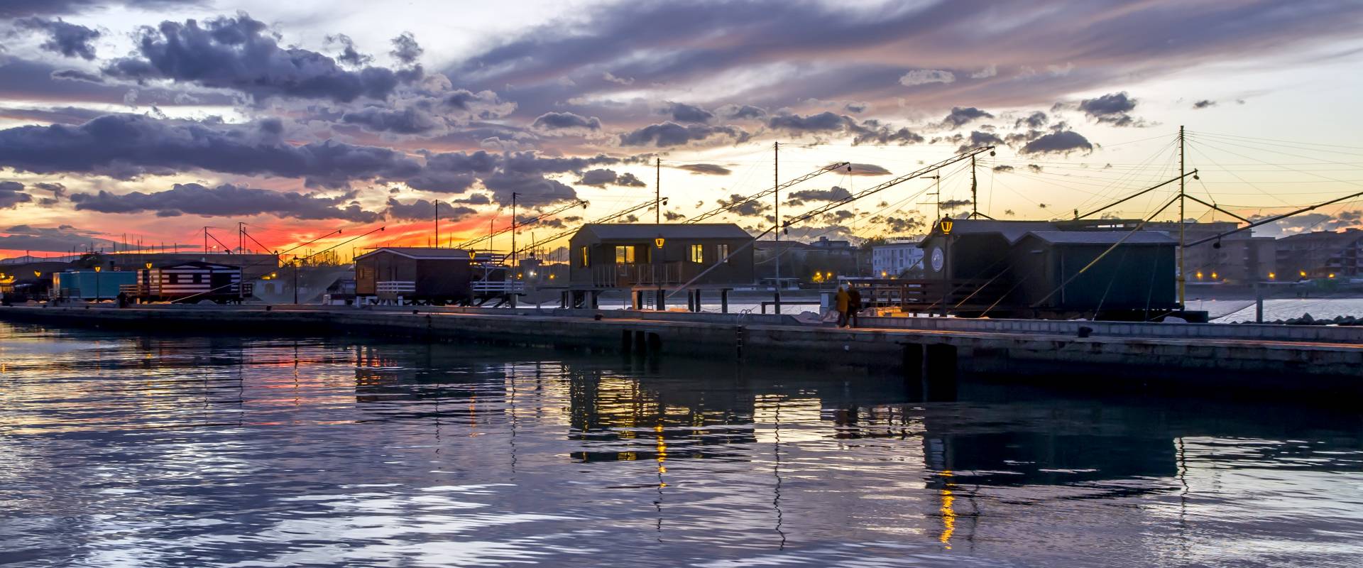 Porto canale , capanni da pesca al tramonto foto di Marco della pasqua